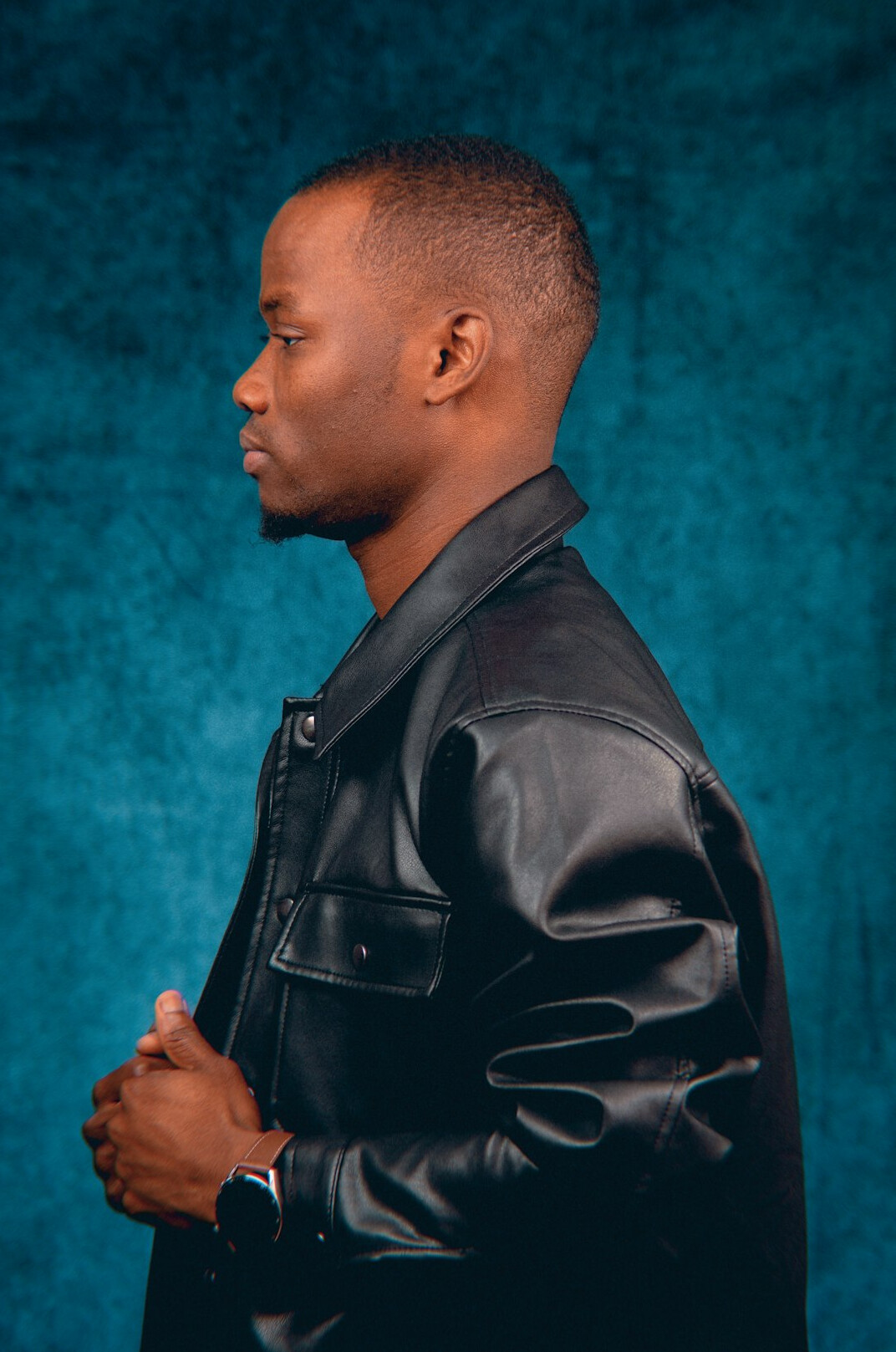 Portrait of a man with short hair in a business jacket